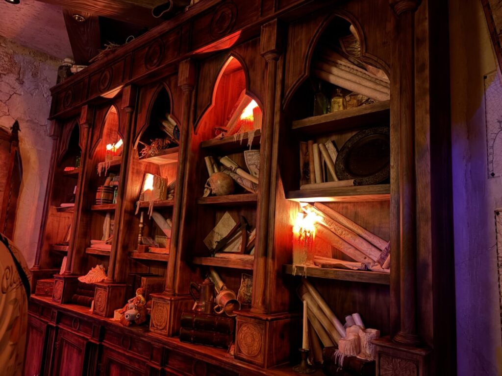 Shelves of artifacts and maps at Beak and Barrel