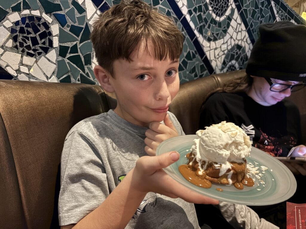 Thatcher and his Pineapple Coconut Bread Pudding at Coral Reef restaurant