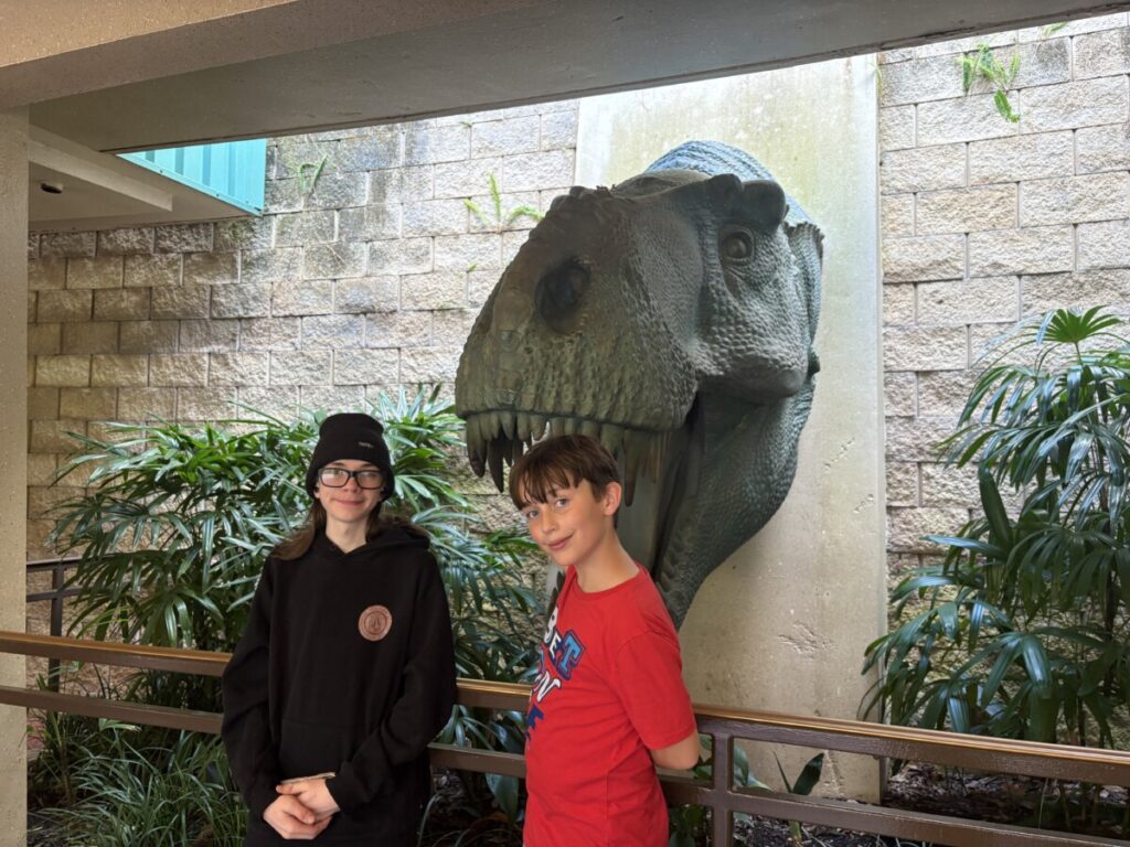 Carnotaurus sculpture in the queue line
