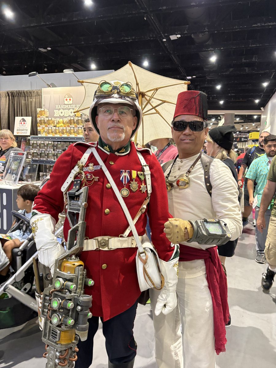 I did not confirm but looks like Colonel Suchbench and Otis T Wren from Adventurers Club but make it steam punk