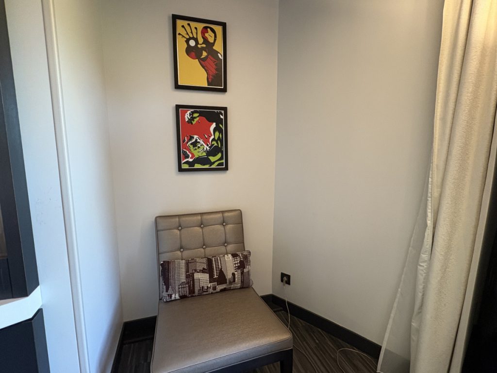 Sitting area with Marvel artwork